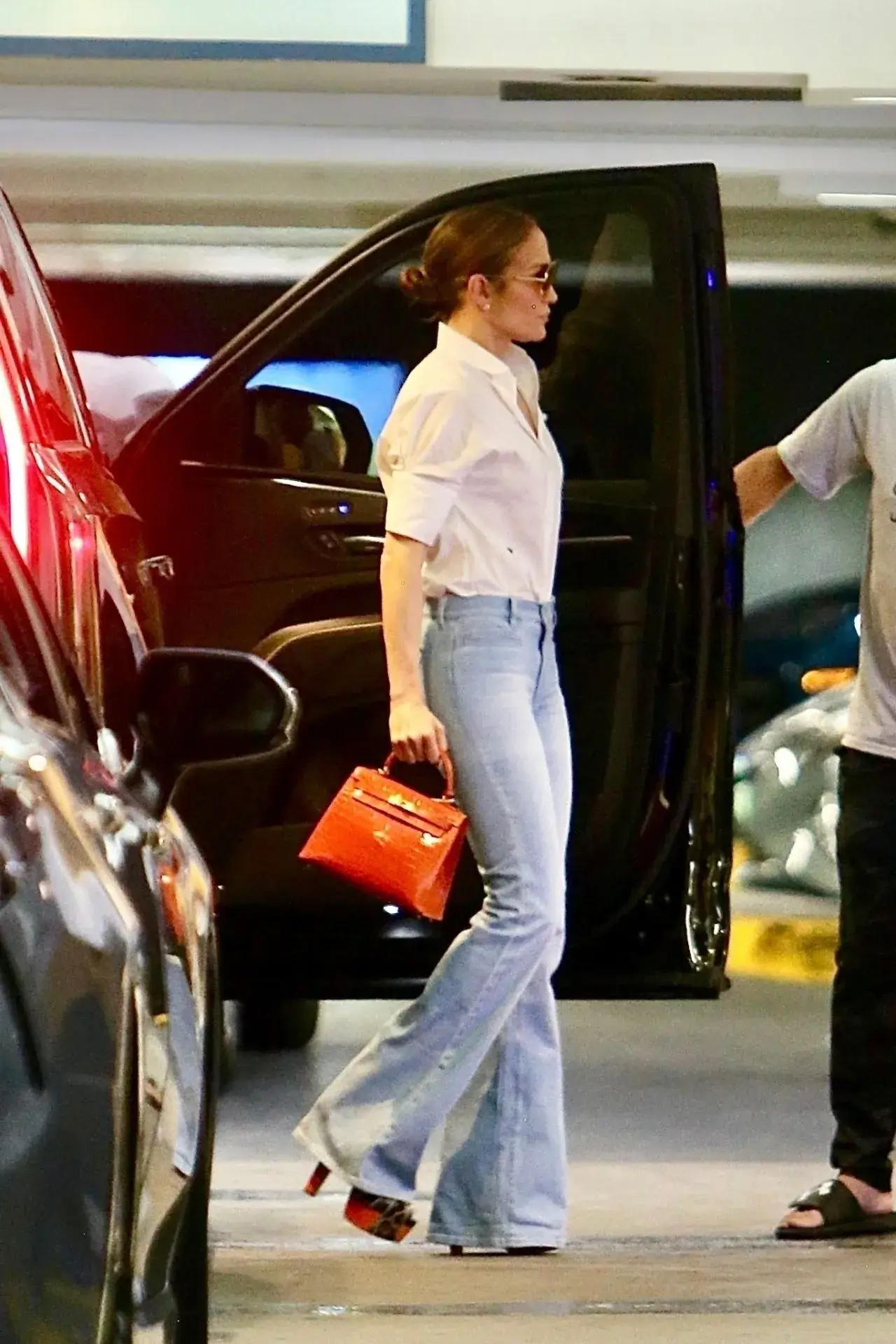 Jennifer Lopez Photoshoot in White Shirt and Blue Jeans